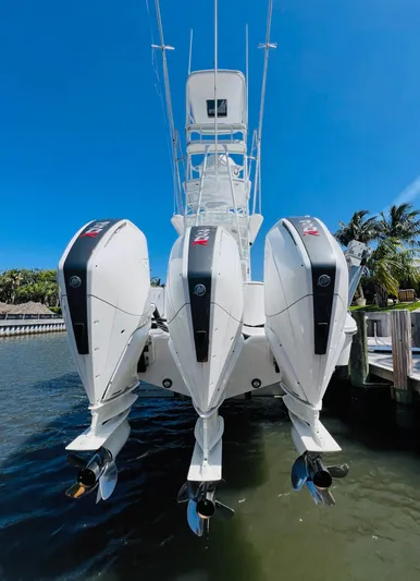  Yacht Photos Pics 2015 Billfish 39 Custom CC boat with triple outboard engines docked.