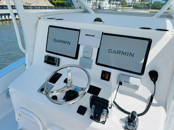  Yacht Photos Pics 2015 Billfish 39 Custom CC boat helm with dual Garmin displays and Mercury controls.