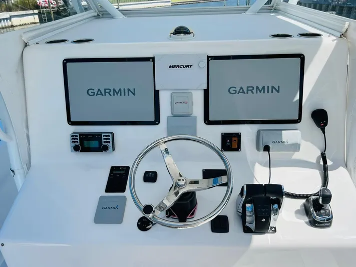  Yacht Photos Pics 2015 Billfish 39 Custom CC helm with dual Garmin displays and Mercury controls.