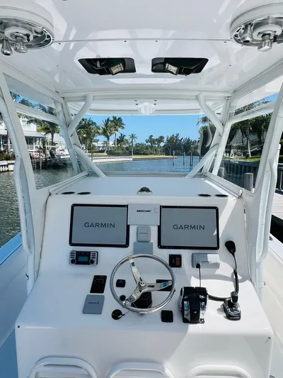  Yacht Photos Pics 2015 Billfish 39 Custom CC boat helm with Garmin navigation system.