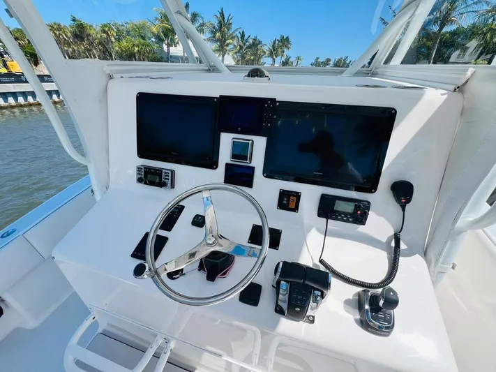  Yacht Photos Pics 2015 Billfish 39 Custom CC helm with dual screens and navigation controls.