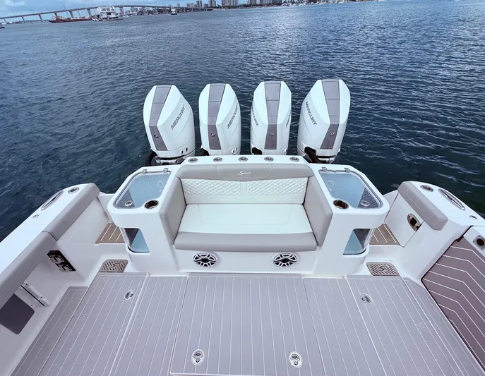  Yacht Photos Pics 2024 Scout 400 LXF boat with four Mercury engines on the water.