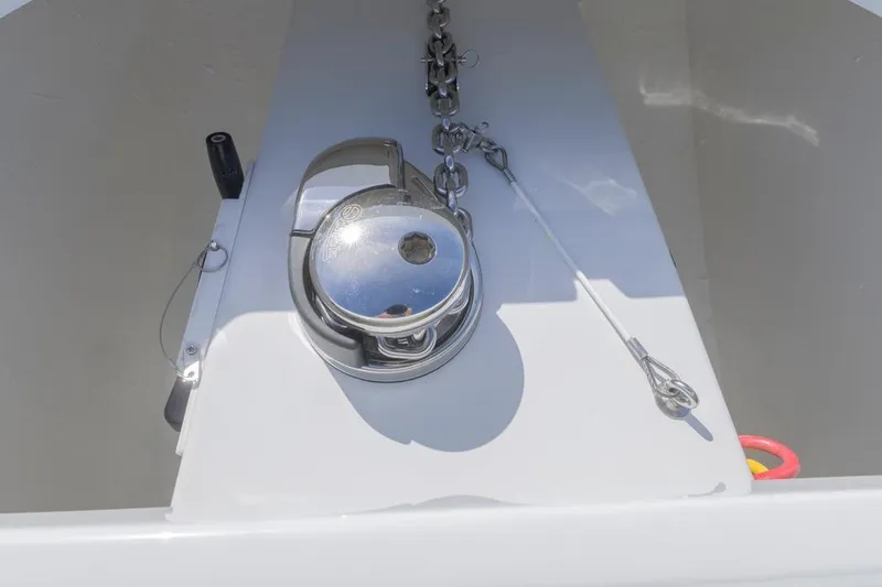  Yacht Photos Pics Anchor winch on 2026 Invincible 46 Catamaran deck, featuring stainless steel components.