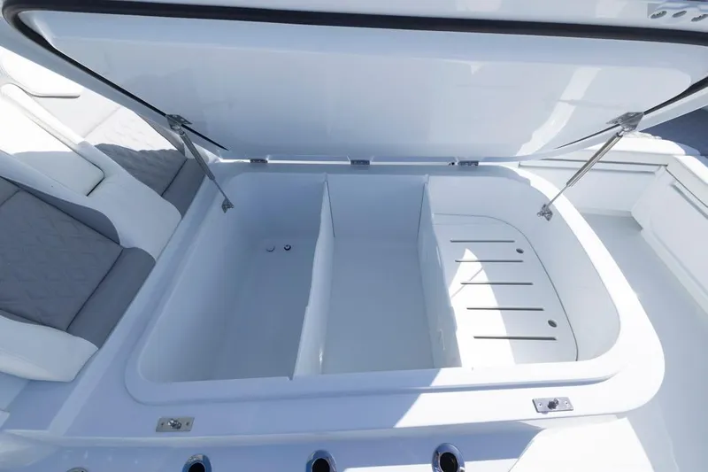  Yacht Photos Pics Open storage compartment on 2026 Invincible 46 Catamaran, featuring spacious interior and sleek design.