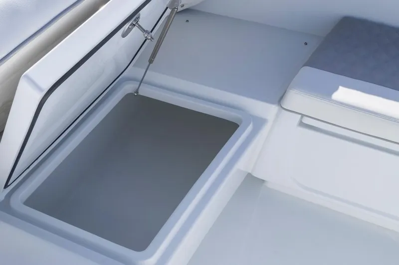  Yacht Photos Pics Storage compartment on 2026 Invincible 46 Catamaran, featuring sleek design and cushioned seating.