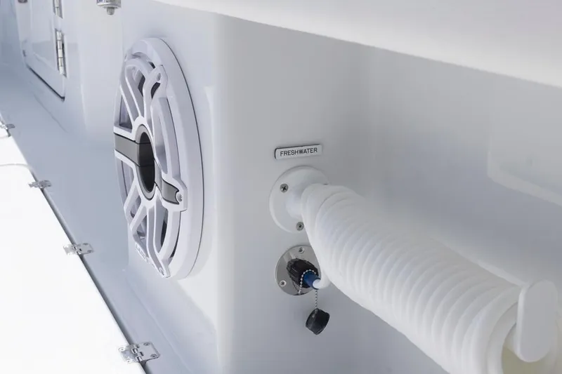  Yacht Photos Pics Close-up of 2026 Invincible 46 Catamaran's freshwater hose and speaker system.
