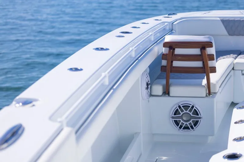  Yacht Photos Pics 2026 Invincible 46 Catamaran deck with seating and ocean view.