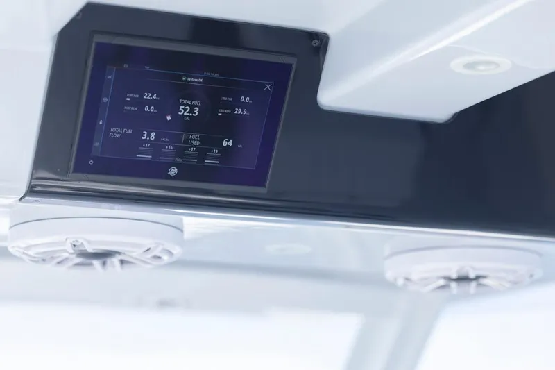  Yacht Photos Pics Display screen on 2026 Invincible 46 Catamaran showing fuel data and speakers.