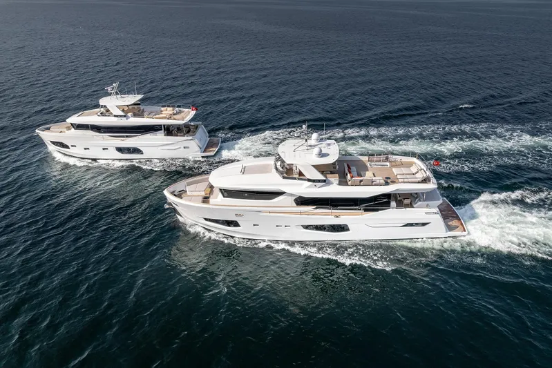 Numarine 22xp Yacht Photos Pics Two 2025 Numarine 22XP yachts cruising on open water.