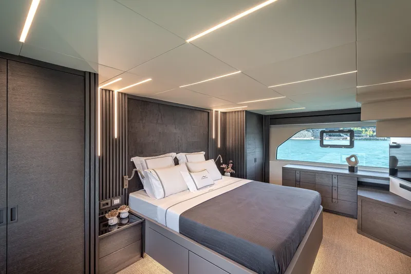 Numarine 22xp Yacht Photos Pics Luxurious bedroom interior of 2025 Numarine 22XP yacht with modern design and waterfront view.