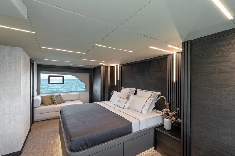 Numarine 22xp Yacht Photos Pics Luxurious bedroom interior of 2025 Numarine 22XP yacht with ocean view and modern design.