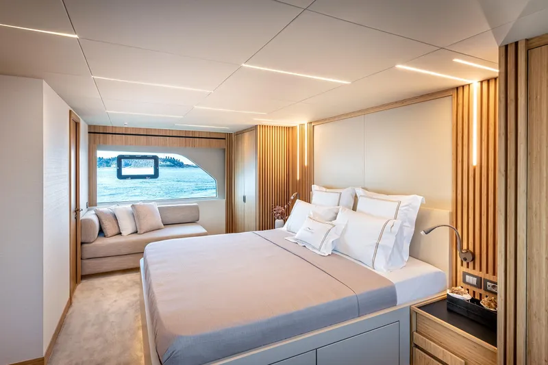 Numarine 22xp Yacht Photos Pics Luxurious bedroom interior of 2025 Numarine 22xp yacht with ocean view.