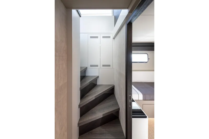 Numarine 22xp Yacht Photos Pics Interior of 2025 Numarine 22XP yacht featuring modern staircase and cabin.