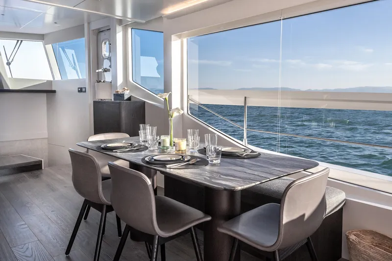 Numarine 22xp Yacht Photos Pics Luxurious dining area on 2025 Numarine 22XP yacht with ocean view.