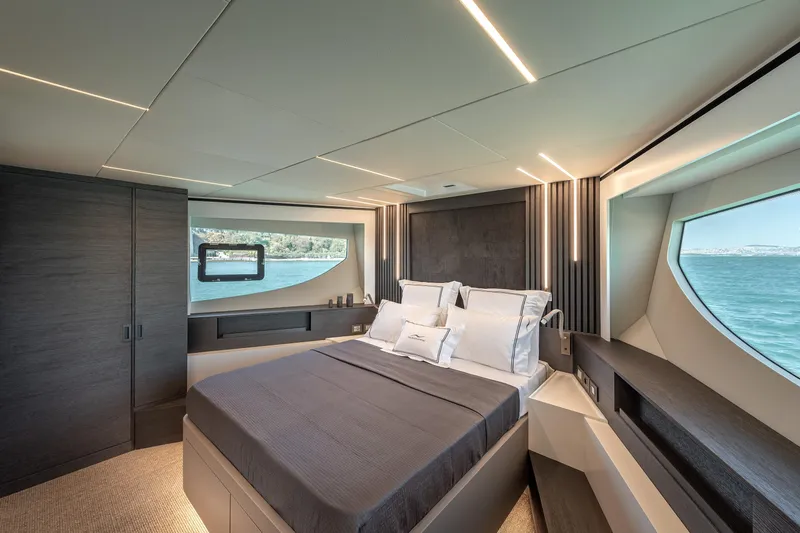 Numarine 22xp Yacht Photos Pics Luxurious bedroom interior of 2025 Numarine 22XP yacht with ocean view.
