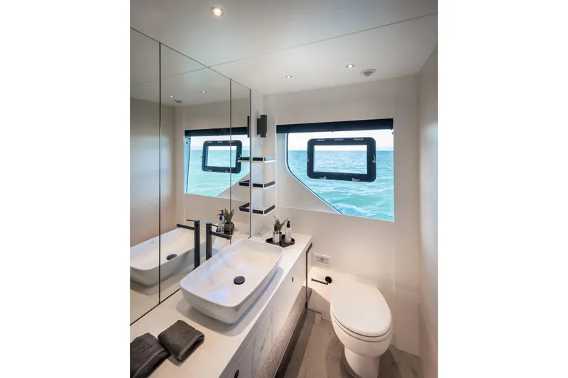 Numarine 22xp Yacht Photos Pics Luxurious bathroom interior of 2025 Numarine 22XP yacht with ocean view.