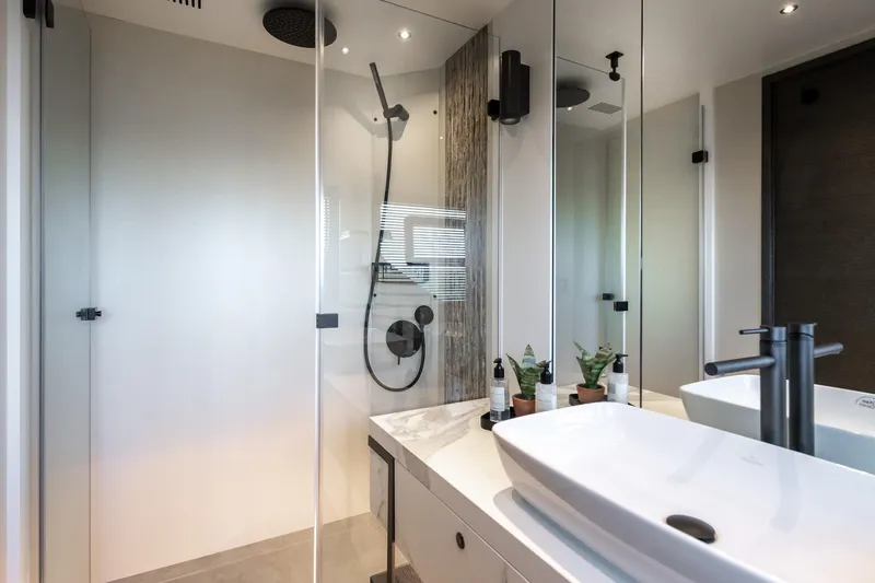 Numarine 22xp Yacht Photos Pics Modern bathroom in 2025 Numarine 22xp yacht with sleek fixtures and elegant design.