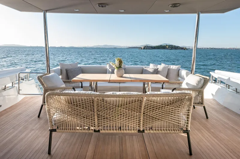 Numarine 22xp Yacht Photos Pics Outdoor seating area on 2025 Numarine 22XP yacht with ocean view.