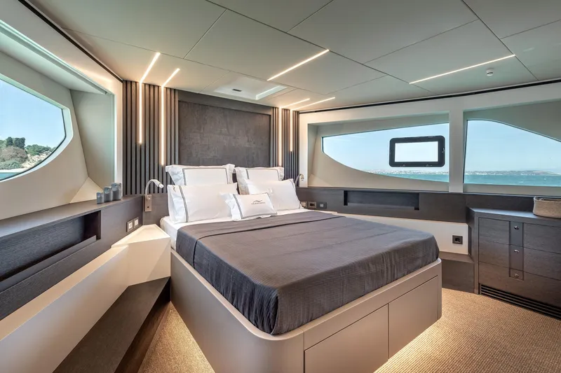 Numarine 22xp Yacht Photos Pics Luxurious bedroom interior of 2025 Numarine 22xp yacht with modern design and ocean view.