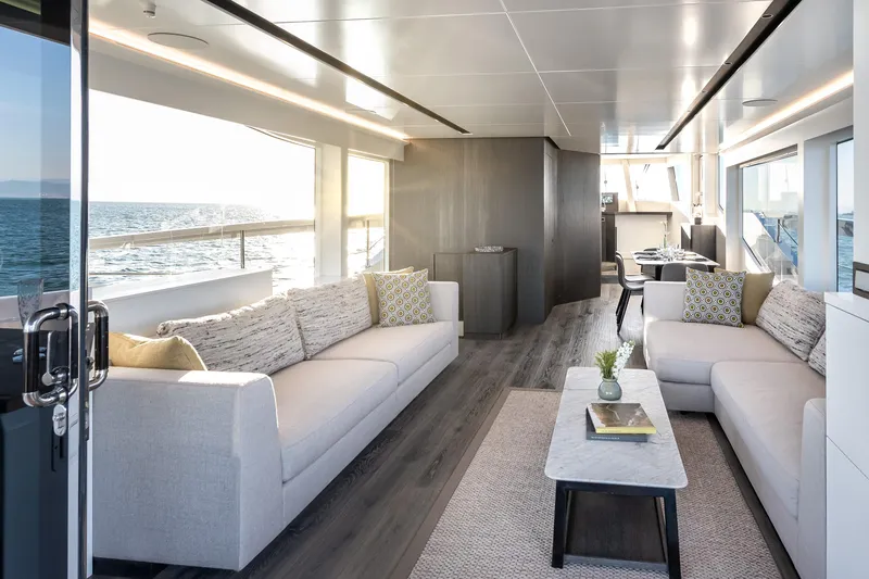 Numarine 22xp Yacht Photos Pics Luxurious interior of 2025 Numarine 22XP yacht with modern sofas and ocean view.