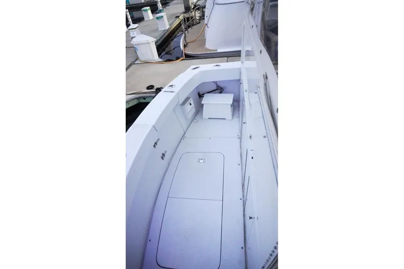 Sunset Grille Yacht Photos Pics 1990 Hatteras 62 Cockpit Motor Yacht deck view at marina.