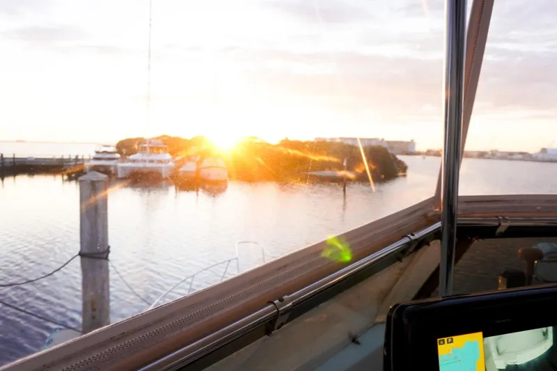Sunset Grille Yacht Photos Pics Sunset view from 1990 Hatteras 62 Cockpit Motor Yacht, overlooking marina.