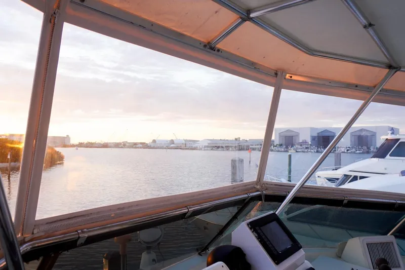 Sunset Grille Yacht Photos Pics View from 1990 Hatteras 62 Cockpit Motor Yacht, overlooking marina at sunset.