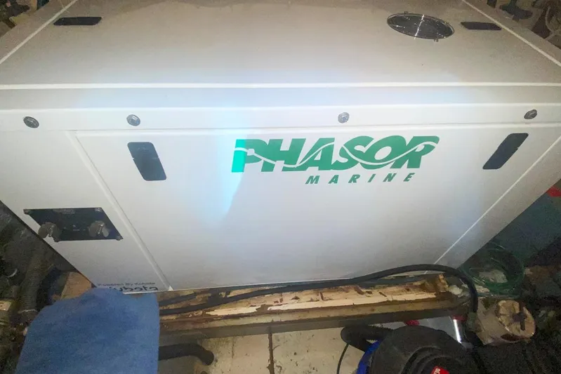 Sunset Grille Yacht Photos Pics Phasor Marine generator on 1990 Hatteras 62 Cockpit Motor Yacht.