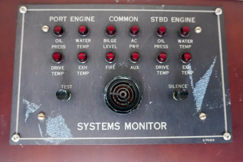 Sunset Grille Yacht Photos Pics 1990 Hatteras 62 Cockpit Motor Yacht systems monitor panel with engine indicators.