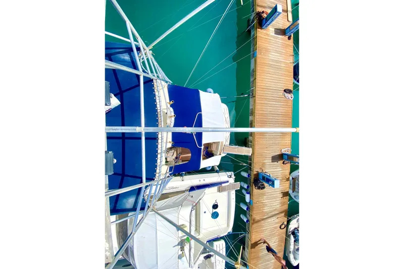  Yacht Photos Pics Overhead view of 1990 Hatteras 41 Convertible yacht docked at marina.