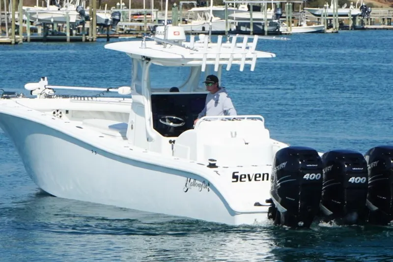 Yacht Photos Pics 2007 Yellowfin 36 Offshore boat with multiple outboard engines on the water.