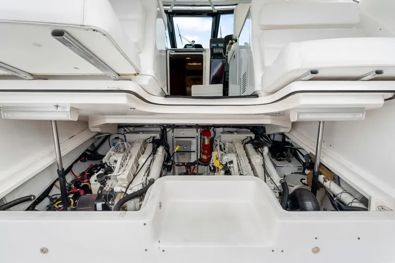  Yacht Photos Pics Engine compartment of a 2004 Tiara Yachts 3800 Open, showcasing dual engines and equipment.