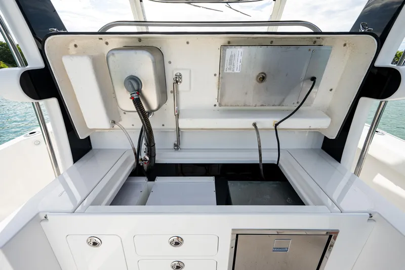  Yacht Photos Pics 2020 Edgewater 370CC boat interior with storage compartments and equipment.