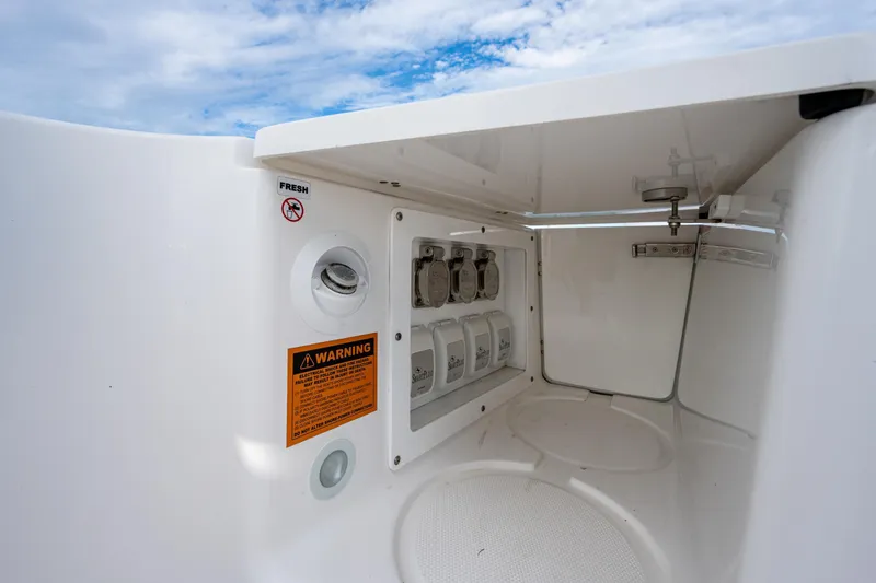  Yacht Photos Pics Interior view of 2020 Edgewater 370CC boat compartment with utility controls.