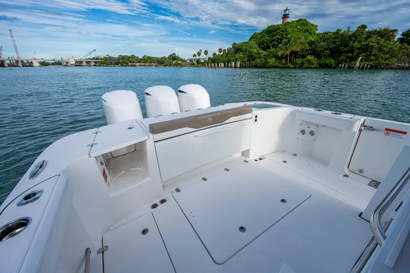  Yacht Photos Pics 2020 Edgewater 370CC boat with triple engines, spacious deck, scenic water view.