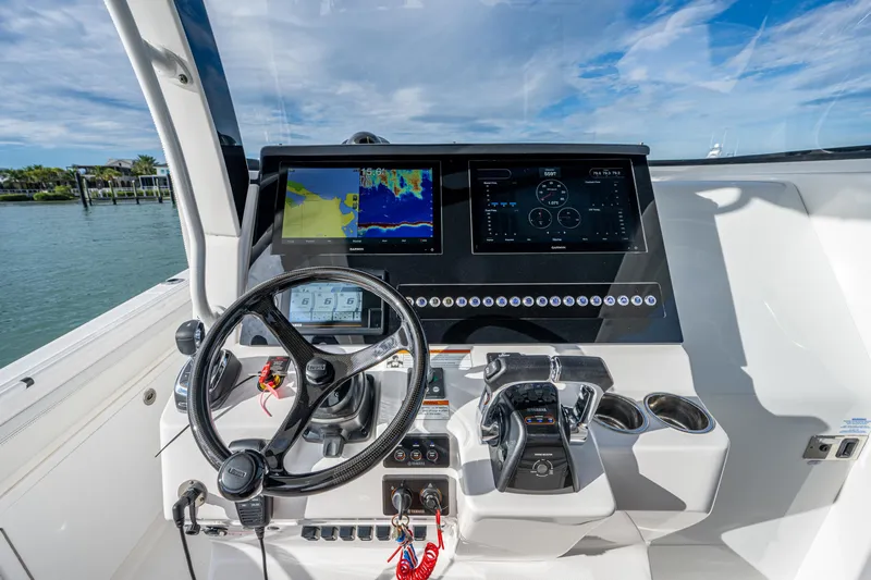  Yacht Photos Pics 2020 Edgewater 370CC boat dashboard with advanced navigation and control systems.