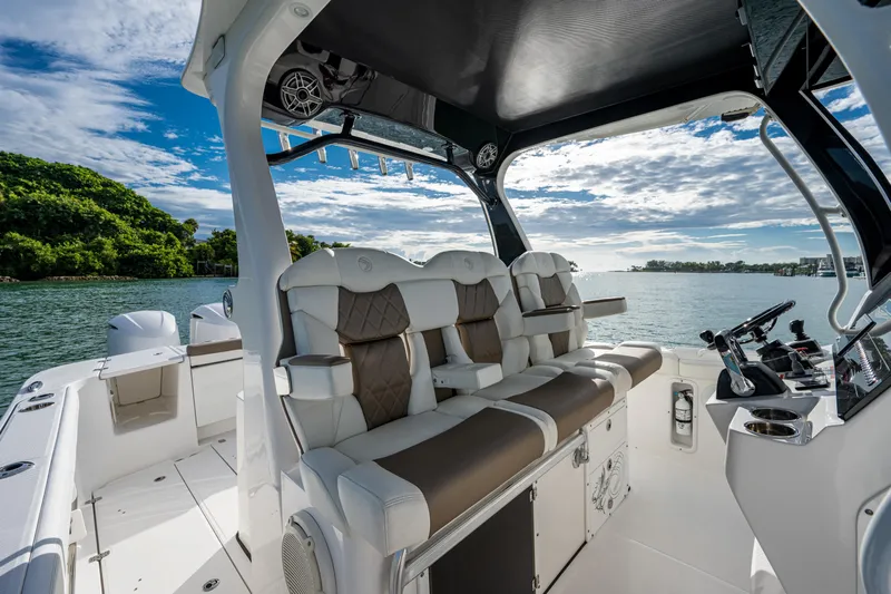  Yacht Photos Pics 2020 Edgewater 370CC boat interior with luxurious seating and scenic water view.