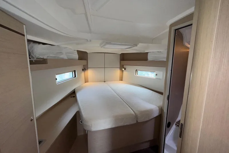 Bluebird Yacht Photos Pics Interior cabin of 2022 Beneteau Oceanis 40.1 yacht, featuring a cozy double bed.
