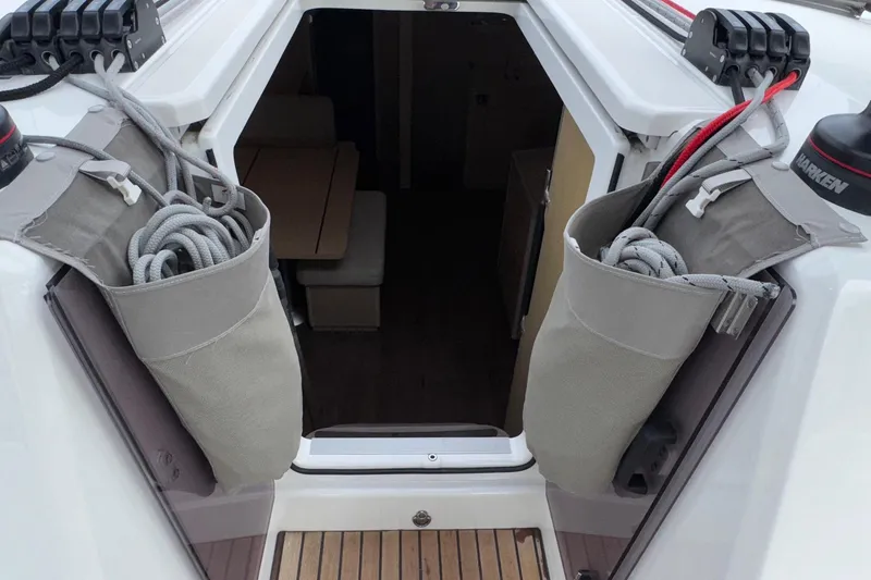 Bluebird Yacht Photos Pics 2022 Beneteau Oceanis 40.1 yacht cockpit entrance with rope storage bags.