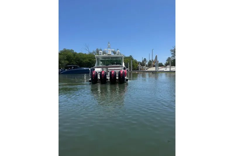  Yacht Photos Pics 2020 Formula 430 Super Sport Crossover boat with multiple engines on calm water.