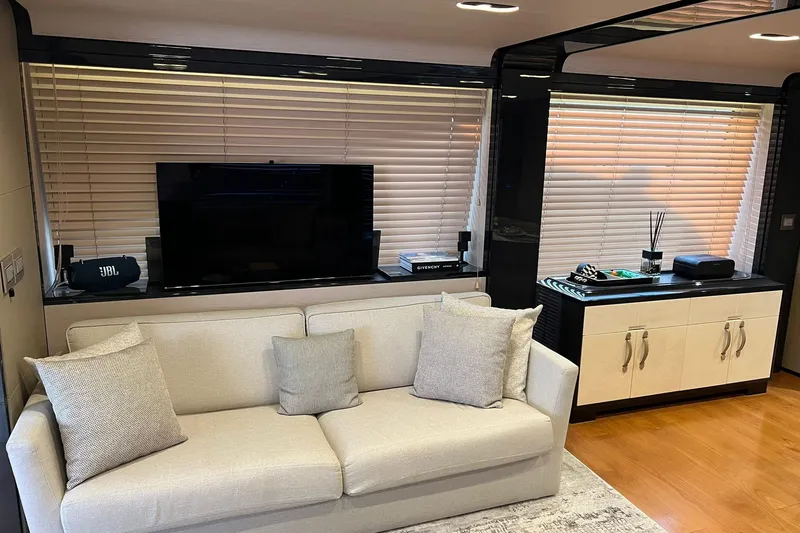  Yacht Photos Pics Luxurious interior of 2015 Azimut 80 yacht with modern decor and entertainment setup.