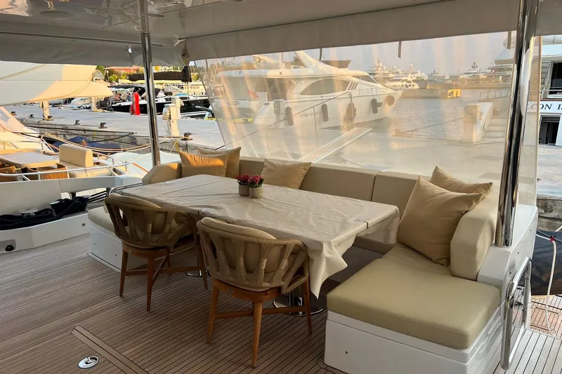  Yacht Photos Pics Luxurious 2015 Azimut 80 yacht deck with elegant dining area and marina view.