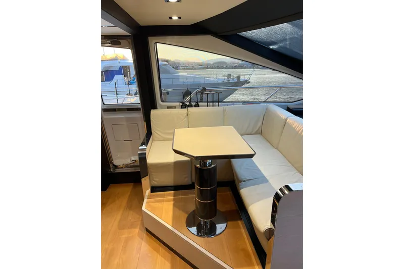  Yacht Photos Pics Luxurious interior of 2015 Azimut 80 yacht with elegant seating and table.