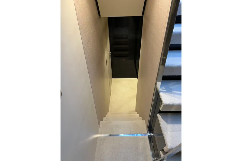  Yacht Photos Pics Staircase inside 2015 Azimut 80 yacht, featuring modern design and carpeted steps.
