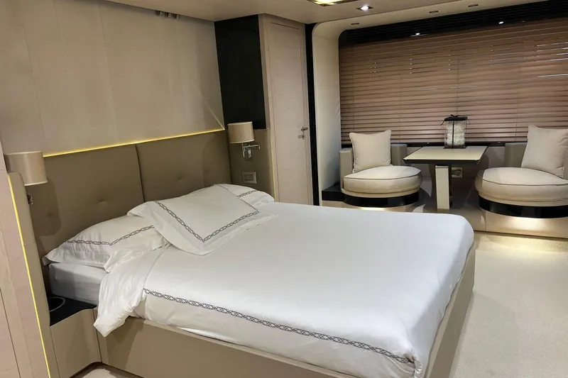  Yacht Photos Pics Luxurious bedroom interior of 2015 Azimut 80 yacht with elegant furnishings.