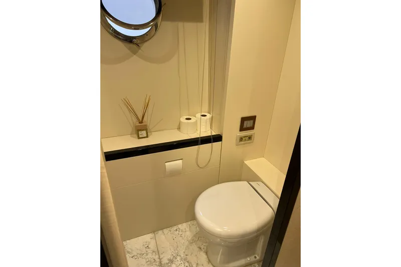  Yacht Photos Pics Luxurious bathroom on 2015 Azimut 80 yacht with modern fixtures and elegant design.