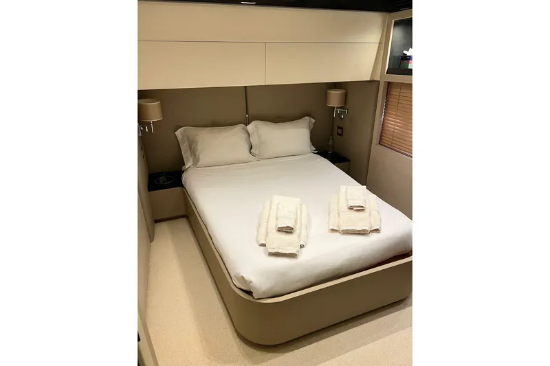  Yacht Photos Pics Luxurious bedroom interior on 2015 Azimut 80 yacht with neatly arranged towels.