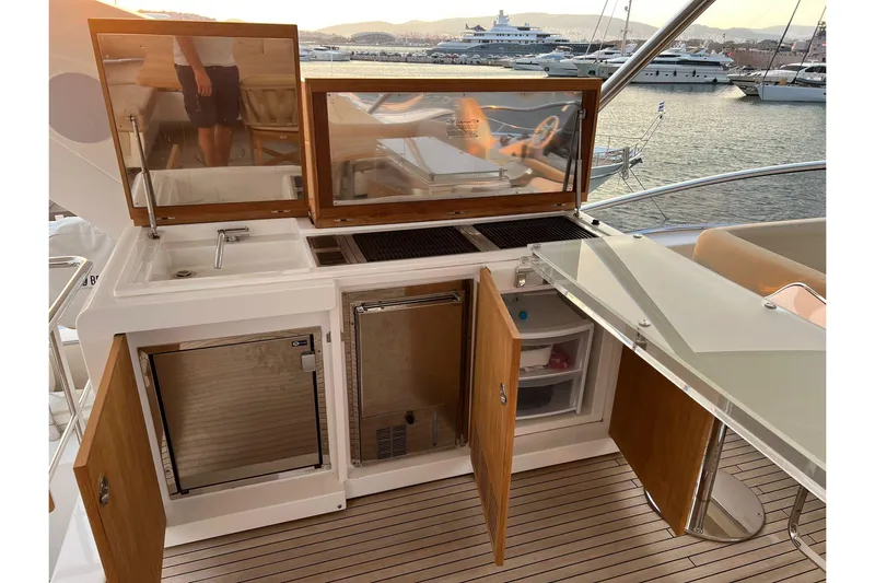  Yacht Photos Pics Outdoor kitchen on 2015 Azimut 80 yacht with grill, sink, and storage.