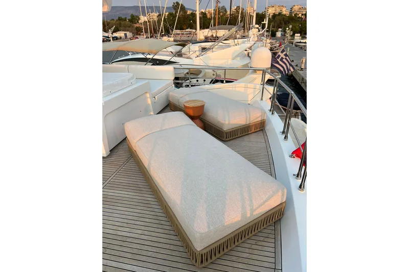  Yacht Photos Pics Luxurious 2015 Azimut 80 yacht deck with sun loungers and scenic marina view.