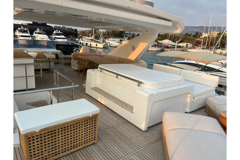  Yacht Photos Pics Luxurious 2015 Azimut 80 yacht deck with elegant seating and scenic marina view.
